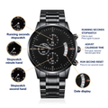 Close-up of engraved black chronograph watch features, including stopwatch functions and date display.
